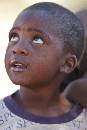 Boy Looking Up (800Wx1200H) - Boy Looking Up - Village in Zambia - 2010 