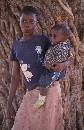 Girl with Baby  (775Wx1200H) - Girl with Baby Brother - Village in Zambia - 2010 