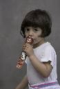 Girl With Candy (600Wx900H) - Girl on Beach With Candy - Capri - 2007 