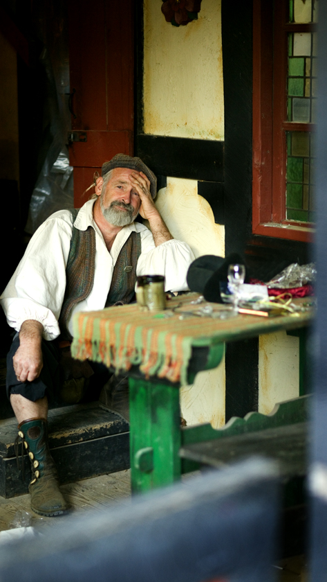 Download Tired Man in Shop (473Wx840H)