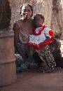 Mother and Girl (835Wx1200H) - Mother and Girl - Village Outside Londolozi - Zambia - 2010 