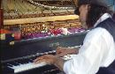  (700Wx454H) - PianoPlayer - Portland - Saturday Market - 2002 